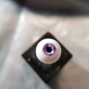 Purple BJD doll eye with nicks